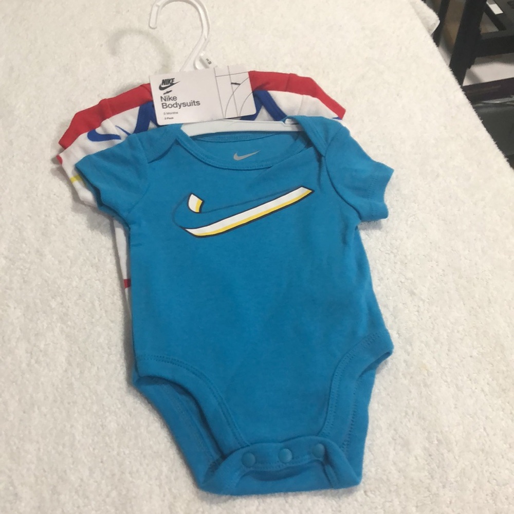 Red and Blue Nike Baby Onesie Set